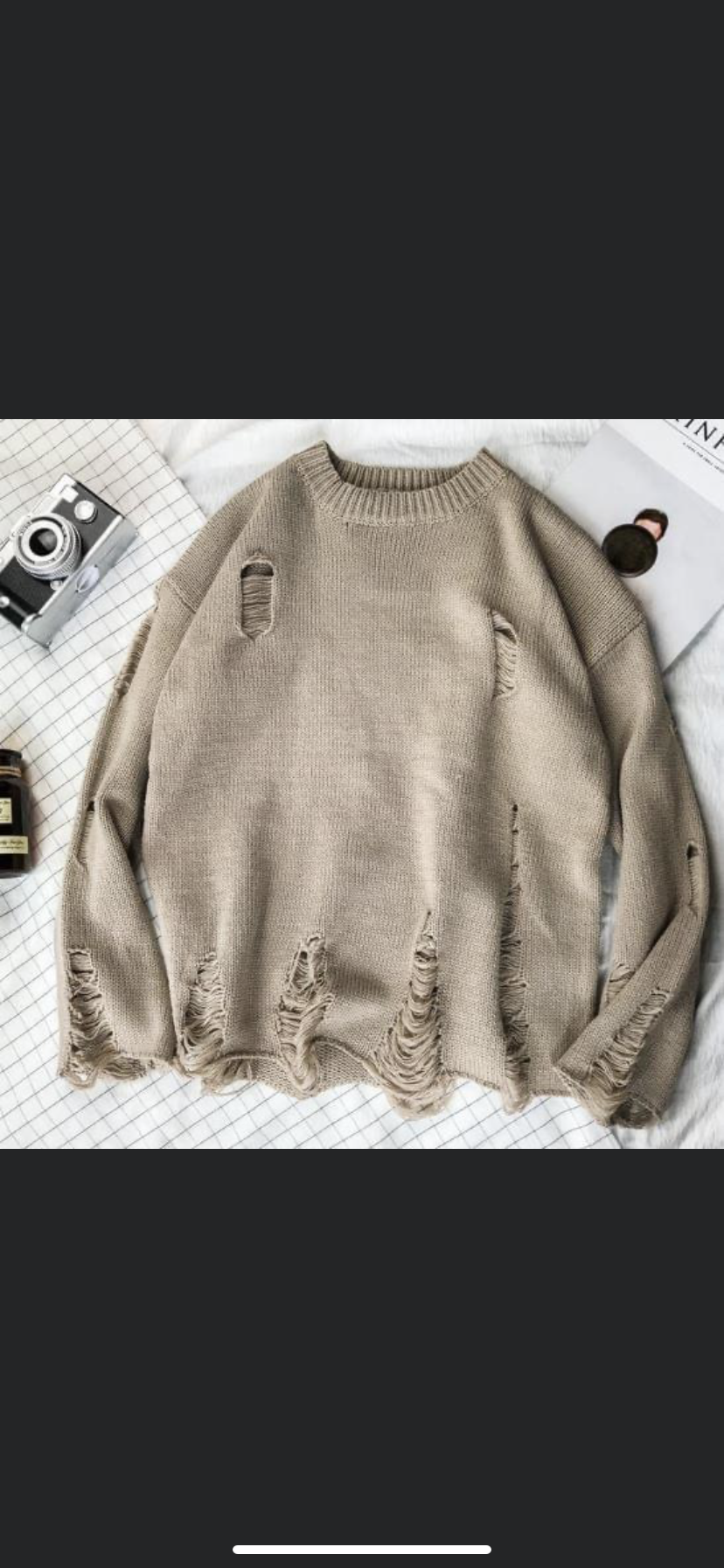 Distressed sweater